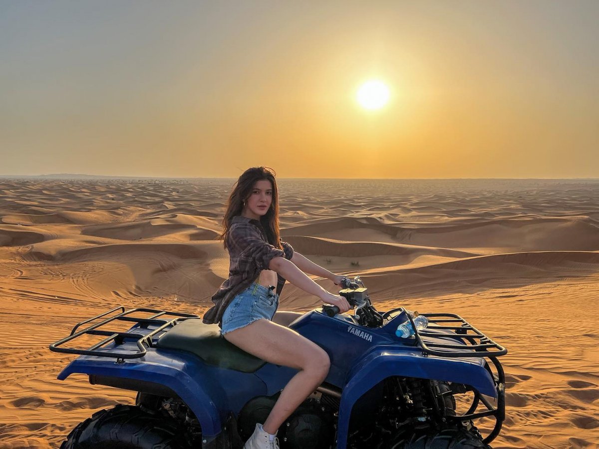 Dune Bashing Action - 4x4 vehicle climbing sand dunes